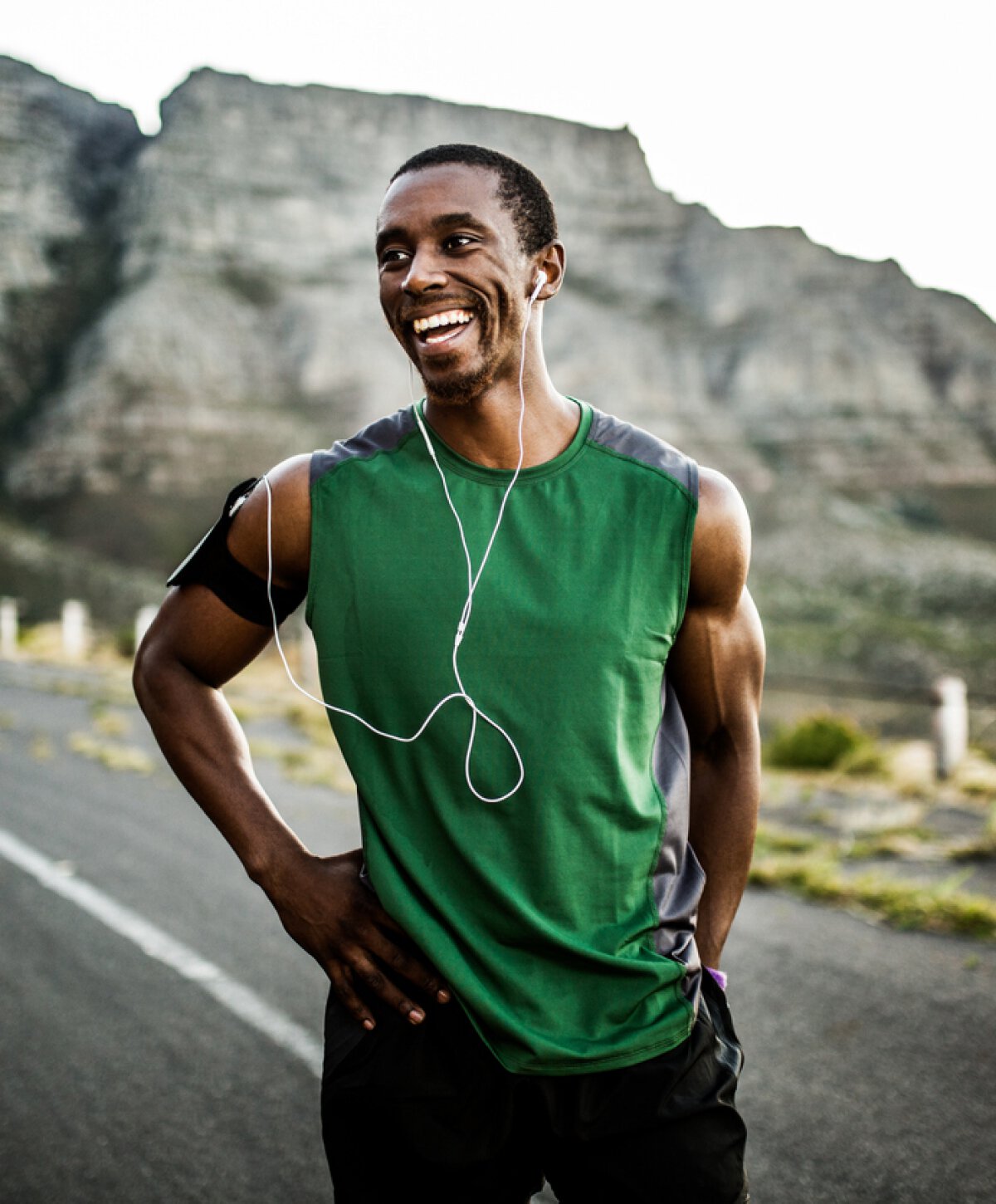 Manchester Gynecomastia surgery model exercising in a green shirt