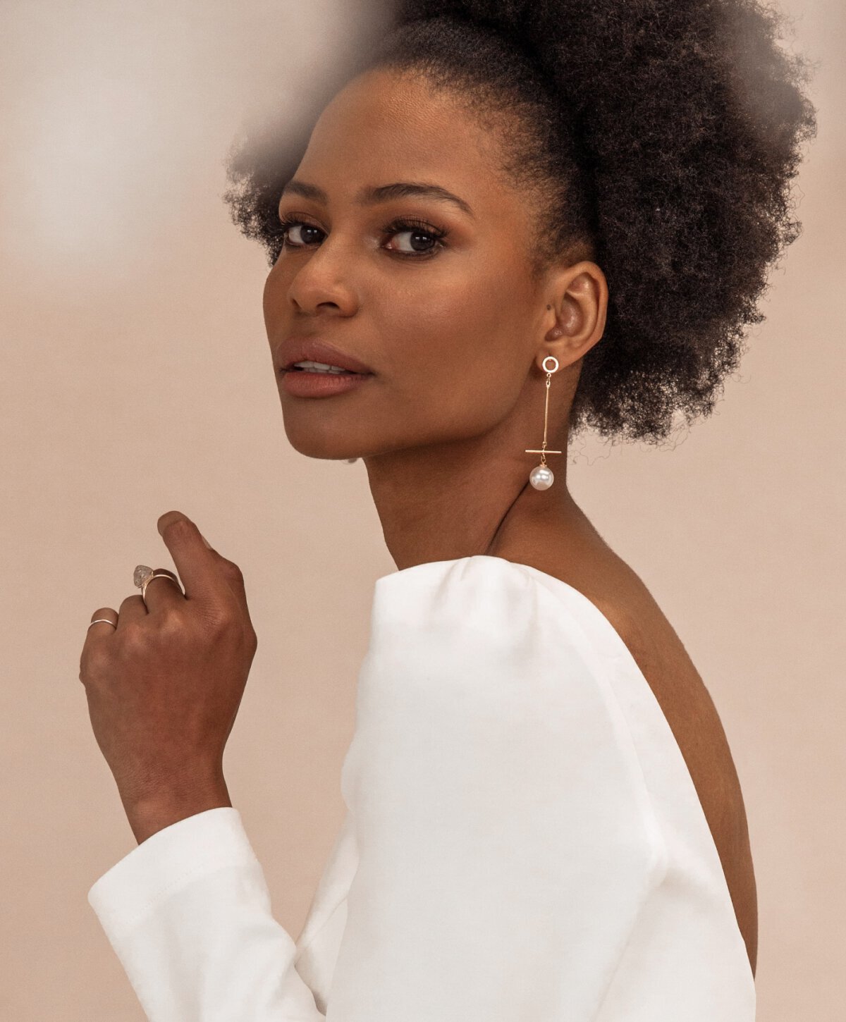 Manchester chemical peel model wearing white